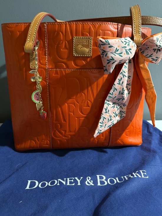 Dooney & Bourke Handbags - vintage Dooney & Bourke Retro Embossed Graffica GUC